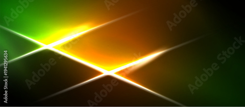 Bright abstract light flares radiate from center. Green, orange, yellow hues blend, creating dynamic visual effect. Dark background emphasizes luminosity.