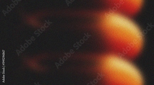 Vibrant orange and red light leak patterns on grainy black background
