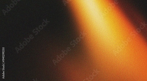 Diagonal golden light beam with heavy film grain and orange gradients