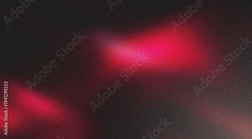 Nebulous pink and red light leak textures on dark grainy background