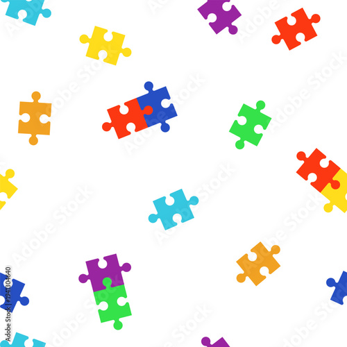 Colorful jigsaw puzzle pieces on seamless pattern. Vector illustration. Dedicated to World Autism Awareness Day. Concept for an engaging educational children's game and wallpaper texture for school.