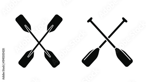 Two pairs of crossed oars displayed in a stark black silhouette