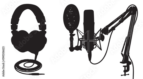 Studio Headphones and Microphone Setup in Minimalist Black Silhouette with High Contrast Lighting for Podcasting