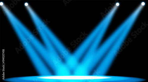 Blue stage spotlights shining down on empty performance area with bright beams