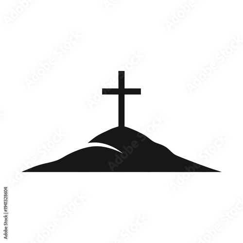 Christian cross on a hill silhouette.