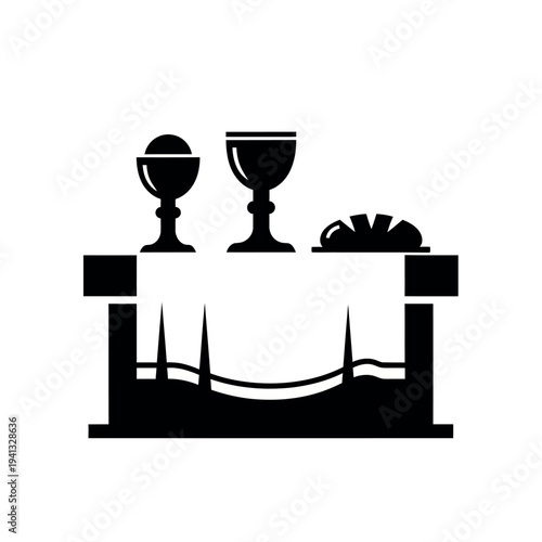 Communion table with chalices and bread.