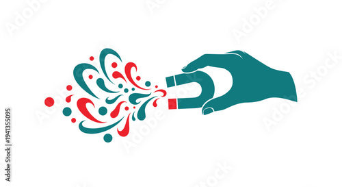 Hand Holding Magnet Attracting Colored Particles.