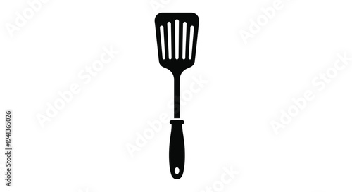 Black silhouette of a kitchen spatula on a white background