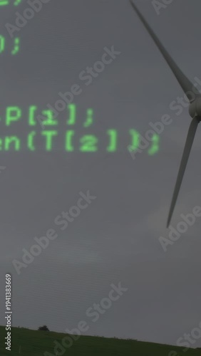 Green code appearing across grey sky causing turbine sliding and blades spinning showing wind power
