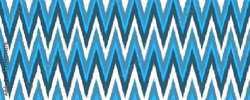 Cyan ikat zigzag line seamless pattern. Abstract chevron tribal ethnic motif. Ornamental tribal fabric swatch design. Great for background, curtain, carpet, wallpaper, clothing, wrapping