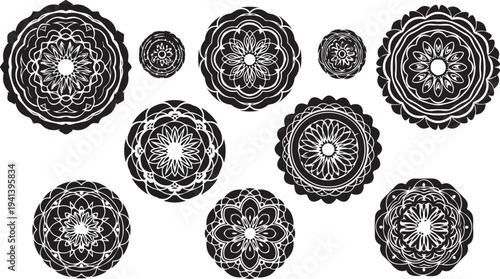 Intricate black and white mandala designs on white background
