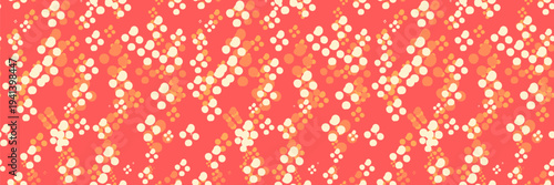 Seamless polka dot pattern with scattered cream and orange circles on coral background. Modern abstract texture for fabric, wrapping paper, wallpaper and textile design