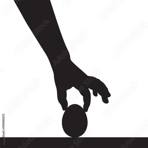 Easter silhouette of hand holding an egg