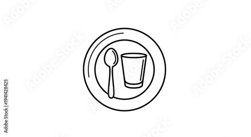 Simple plate with spoon and glass.