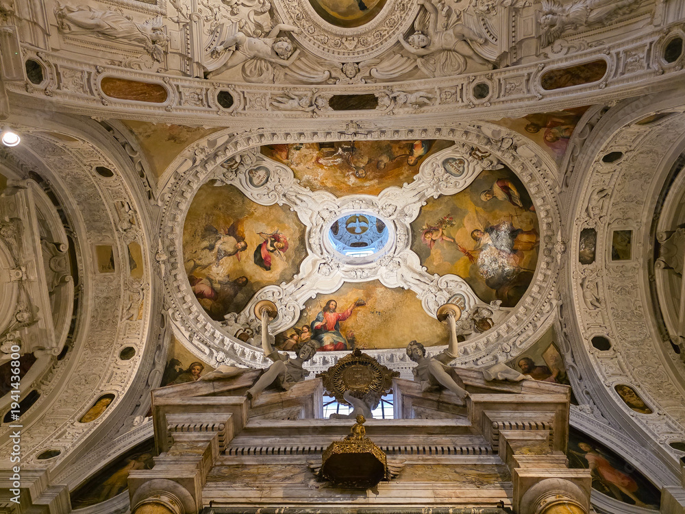 Fototapeta premium SIENA, ITALY - march 7, 2026: : Low angle view of the ornate Baroque ceiling of San Niccolo in Sasso church, featuring frescoes by Giovan Battista Giustammiani and white stucco decorations