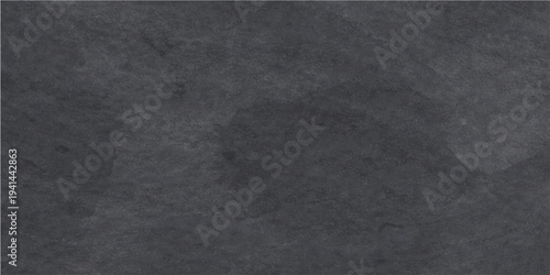 Abstract moody close-up photograph that captures the texture and color variations of a natural slate stone.