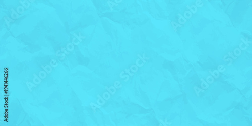 Crumpled cyan blue paper texture background, vibrant wrinkled parchment surface for creative graphic design and posters
