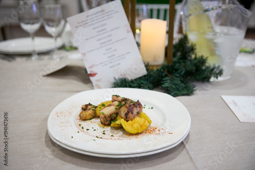 Grilled sirloin steak with potatoes, served as a first course at a wedding. Andalusia, Spain