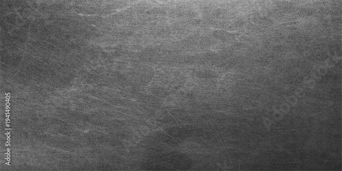 Dark grunge black and white background texture featuring an old gray weathered wall and vintage dirty paper pattern for a blank chalkboard backdrop design