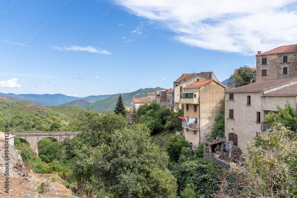 Obraz premium Venaco village and ancient bridge in Corsica