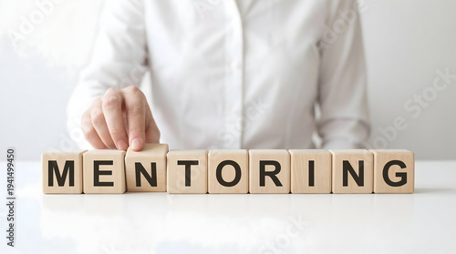 Hand Arranging Wooden Blocks Spelling Mentoring for Career Coaching