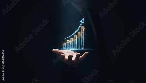 Hand holding rising business graph chart.