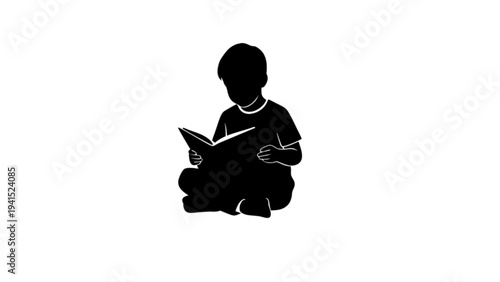 Silhouette of a Little Boy Sitting Cross-Legged Reading