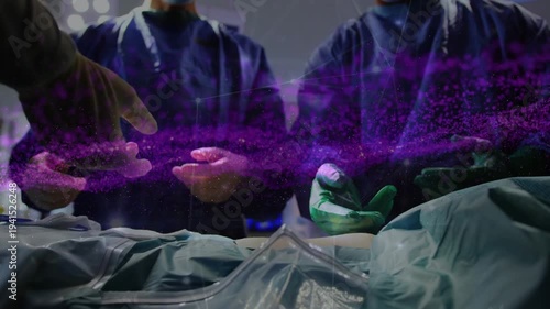 Animation of digital interface over surgeons in operating theatre