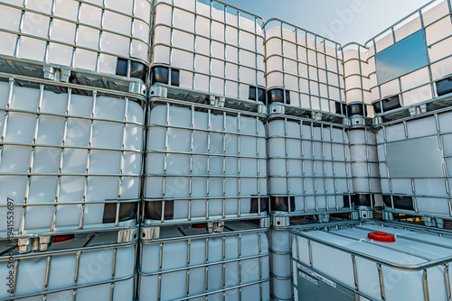 The stock of plastic barrels for the chemical industry. white plastic containers. Chemical industry.