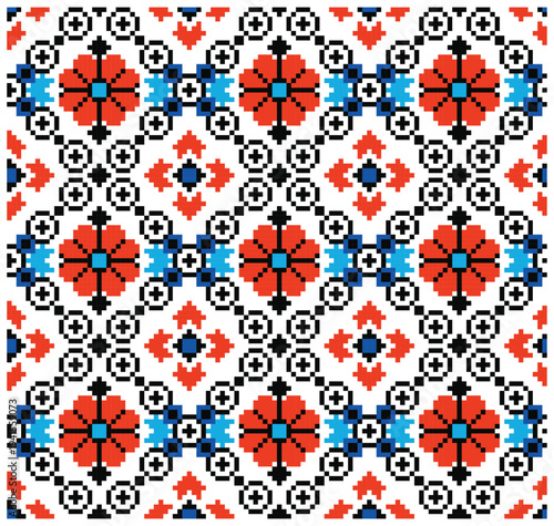 Seamless tile vector pattern with Ukrainian Lviv embroidery with red flowers, colorful ornamental decor and black geometric framing. Endless repeat