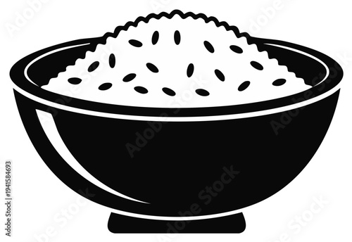 Bowl of cooked white rice filled to the brim with grains spilling over the edge