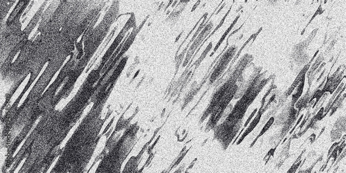 Abstract grayscale background with diagonal streaks and granular texture evoking a sense of movement or rain against a speckled backdrop for artistic and design applications