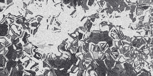 Abstract grayscale pattern with organic shapes and granular texture resembling cellular structures or microscopic formations for backgrounds and design elements