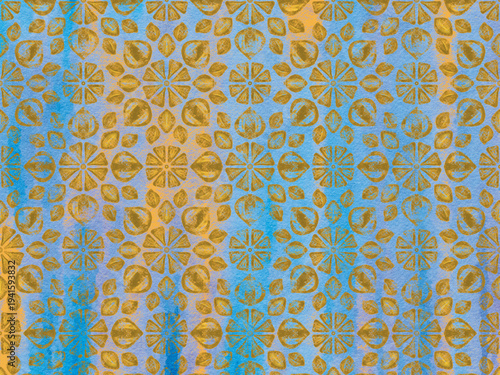 Old faded vintage gold wallpaper, aged floral stationary