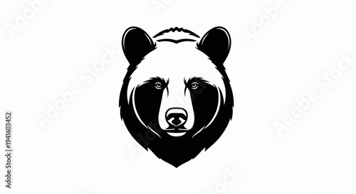 A bold black and white graphic of a bear's face with sharp details
