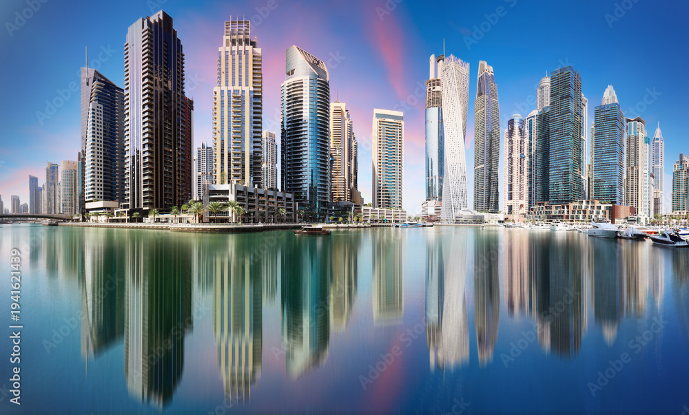 Fototapeta premium Sunset in Dubai Marina with skyscrapers, United Arab Emirates