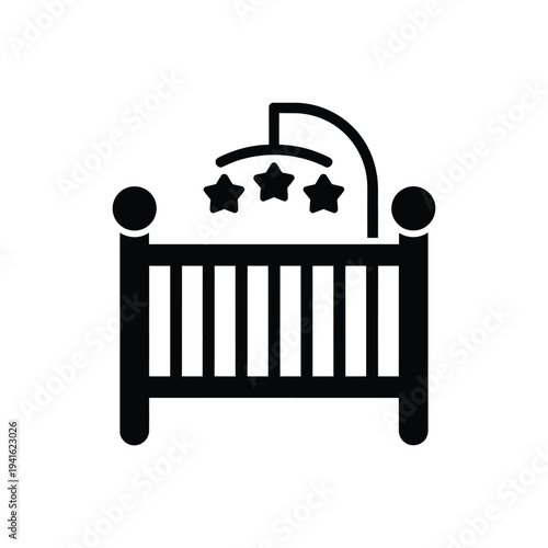 A simple black and white icon depicting a baby crib with a mobile