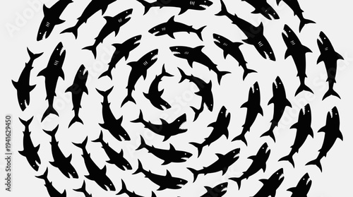 School of fish forming a circular pattern in black and white.