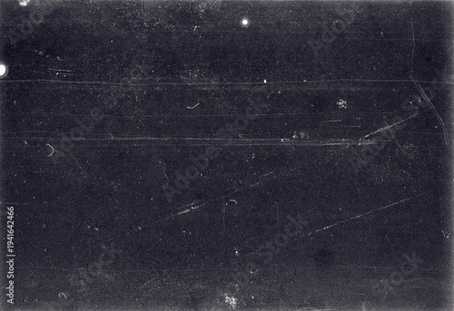 Blank grained film strip texture background with heavy grain and dust