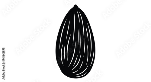 A detailed black silhouette of an almond nut on a white background