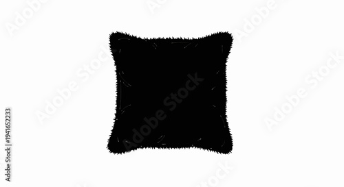Black fluffy cushion with decorative stitching on white background