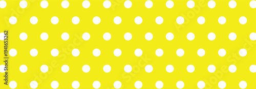 Doodle white polka dots pattern on a yellow background. Polka dot seamless pattern background used in fashion, packaging and graphics design. EPS 10.