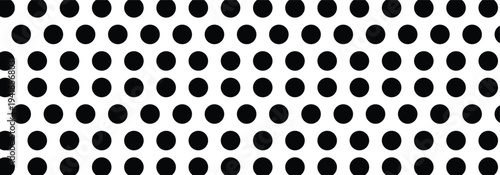 Doodle black polka dots pattern on a white background. Polka dot seamless pattern background used in fashion, packaging and graphics design.