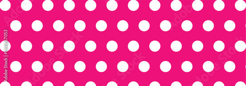 Hand drawn white color cute seamless polka dots patterns on a pink background. Vintage polka dots used in graphic design, pop art, home decoration and textile product.