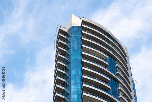 12.12.2025 Sharjah, UAE. Modern residential and commercial skyscrapers in Sharjah city skyline, contemporary urban architecture and high-rise buildings at United Arab Emirates against.