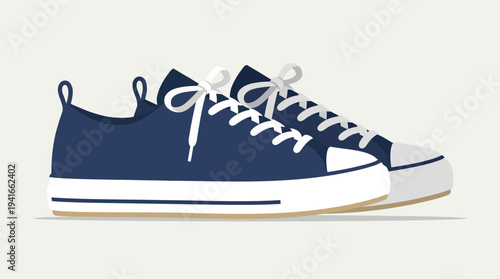 Pair of navy blue low-top sneakers with white laces and soles.