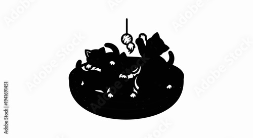 Playful kittens interacting with a string toy in a circular grouping