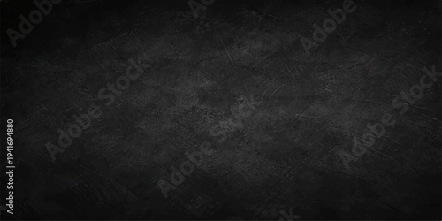 Dark grunge paper texture with black and white chalk on a vintage empty blackboard surface for a dark textured wall backdrop design