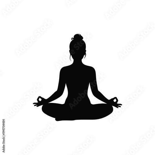 Black silhouette of a person meditating in a cross-legged pose