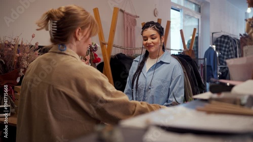 Friendly Staff Talking With Customer At Boutique Counter, Warm Smile And Order Packing Interaction